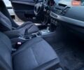 Серый Мицубиси Лансер, объемом двигателя 2 л и пробегом 170 тыс. км за 7500 $, фото 31 на Automoto.ua