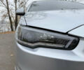 Сірий Міцубісі Lancer, об'ємом двигуна 2 л та пробігом 253 тис. км за 8700 $, фото 12 на Automoto.ua