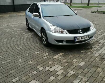 Сірий Міцубісі Lancer, об'ємом двигуна 1.6 л та пробігом 225 тис. км за 5200 $, фото 3 на Automoto.ua