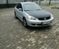 Сірий Міцубісі Lancer, об'ємом двигуна 1.6 л та пробігом 225 тис. км за 5200 $, фото 3 на Automoto.ua