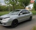 Серый Мицубиси Лансер, объемом двигателя 1.6 л и пробегом 224 тыс. км за 4400 $, фото 1 на Automoto.ua