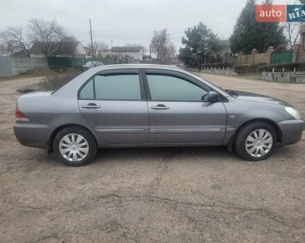 Сірий Міцубісі Lancer, об'ємом двигуна 1.6 л та пробігом 440 тис. км за 4200 $, фото 3 на Automoto.ua