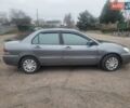 Сірий Міцубісі Lancer, об'ємом двигуна 1.6 л та пробігом 440 тис. км за 4200 $, фото 3 на Automoto.ua