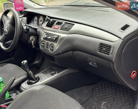 Сірий Міцубісі Lancer, об'ємом двигуна 1.6 л та пробігом 221 тис. км за 3650 $, фото 16 на Automoto.ua