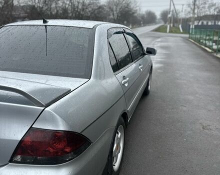 Сірий Міцубісі Lancer, об'ємом двигуна 1.6 л та пробігом 222 тис. км за 4300 $, фото 5 на Automoto.ua