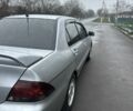 Сірий Міцубісі Lancer, об'ємом двигуна 1.6 л та пробігом 222 тис. км за 4300 $, фото 5 на Automoto.ua