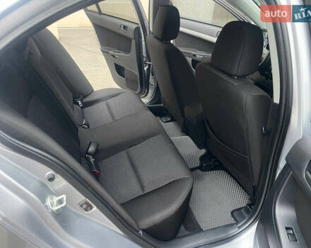 Сірий Міцубісі Lancer, об'ємом двигуна 1.5 л та пробігом 177 тис. км за 5999 $, фото 10 на Automoto.ua