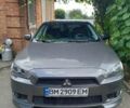 Серый Мицубиси Лансер, объемом двигателя 2 л и пробегом 99 тыс. км за 7800 $, фото 4 на Automoto.ua