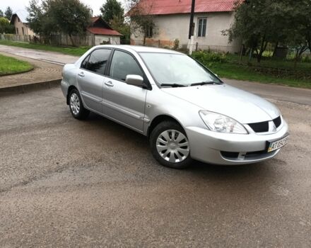 Сірий Міцубісі Lancer, об'ємом двигуна 1.6 л та пробігом 224 тис. км за 3100 $, фото 2 на Automoto.ua