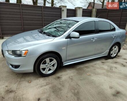 Серый Мицубиси Лансер, объемом двигателя 2 л и пробегом 234 тыс. км за 7200 $, фото 9 на Automoto.ua