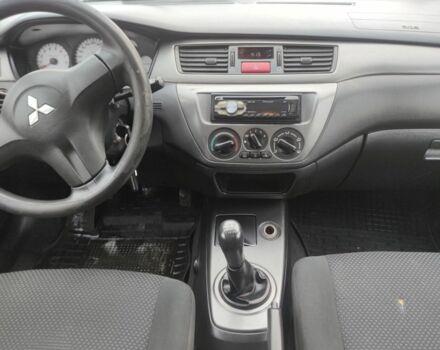 Серый Мицубиси Лансер, объемом двигателя 1.6 л и пробегом 225 тыс. км за 3100 $, фото 4 на Automoto.ua