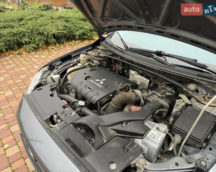 Сірий Міцубісі Lancer, об'ємом двигуна 2 л та пробігом 92 тис. км за 8200 $, фото 46 на Automoto.ua