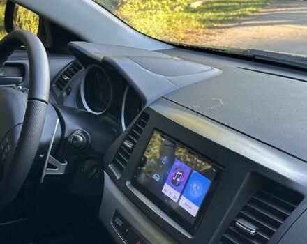 Серый Мицубиси Лансер, объемом двигателя 2 л и пробегом 153 тыс. км за 7500 $, фото 5 на Automoto.ua