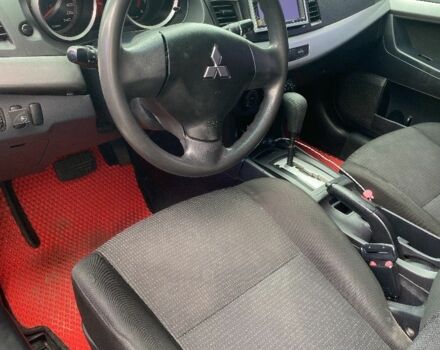 Серый Мицубиси Лансер, объемом двигателя 1.5 л и пробегом 237 тыс. км за 4500 $, фото 7 на Automoto.ua