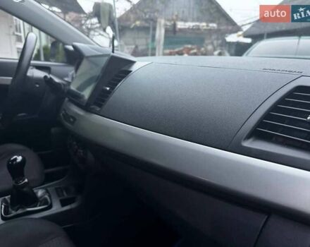 Серый Мицубиси Лансер, объемом двигателя 1.5 л и пробегом 147 тыс. км за 6700 $, фото 18 на Automoto.ua