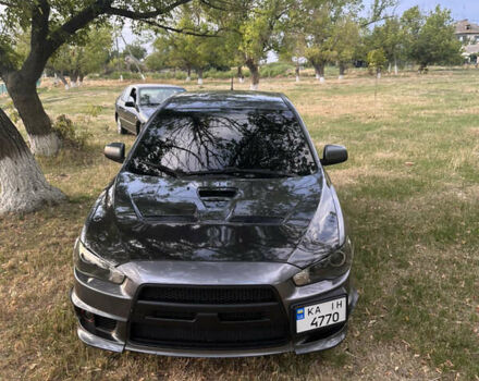 Серый Мицубиси Лансер, объемом двигателя 1.5 л и пробегом 255 тыс. км за 6000 $, фото 3 на Automoto.ua