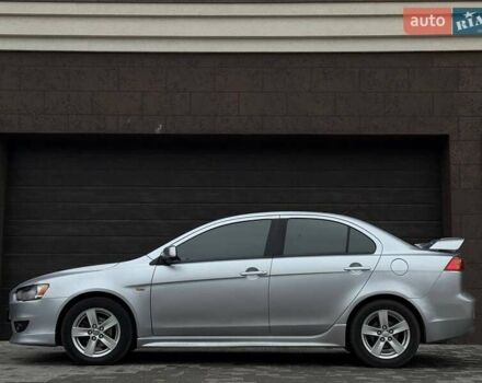 Серый Мицубиси Лансер, объемом двигателя 2 л и пробегом 237 тыс. км за 6899 $, фото 2 на Automoto.ua