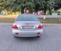 Сірий Міцубісі Lancer, об'ємом двигуна 1.6 л та пробігом 266 тис. км за 3500 $, фото 7 на Automoto.ua