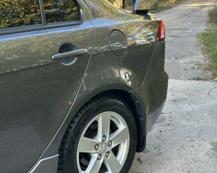 Серый Мицубиси Лансер, объемом двигателя 2 л и пробегом 153 тыс. км за 7500 $, фото 1 на Automoto.ua