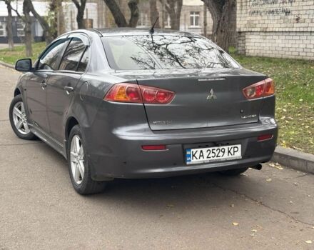 Серый Мицубиси Лансер, объемом двигателя 2 л и пробегом 240 тыс. км за 5450 $, фото 2 на Automoto.ua