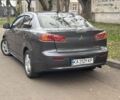 Серый Мицубиси Лансер, объемом двигателя 2 л и пробегом 240 тыс. км за 5450 $, фото 2 на Automoto.ua