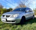 Сірий Міцубісі Lancer, об'ємом двигуна 1.6 л та пробігом 364 тис. км за 4300 $, фото 1 на Automoto.ua