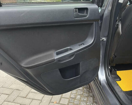 Сірий Міцубісі Lancer, об'ємом двигуна 2 л та пробігом 131 тис. км за 4899 $, фото 12 на Automoto.ua