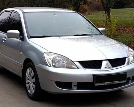 Серый Мицубиси Лансер, объемом двигателя 1.58 л и пробегом 176 тыс. км за 5000 $, фото 3 на Automoto.ua