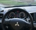 Серый Мицубиси Лансер, объемом двигателя 2 л и пробегом 153 тыс. км за 7500 $, фото 2 на Automoto.ua