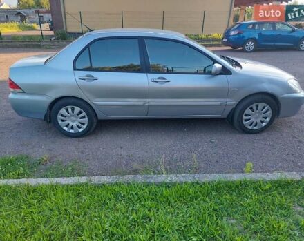 Серый Мицубиси Лансер, объемом двигателя 1.6 л и пробегом 117 тыс. км за 3980 $, фото 9 на Automoto.ua