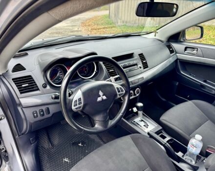 Серый Мицубиси Лансер, объемом двигателя 2 л и пробегом 225 тыс. км за 6890 $, фото 9 на Automoto.ua