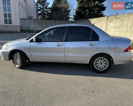 Серый Мицубиси Лансер, объемом двигателя 1.6 л и пробегом 193 тыс. км за 4000 $, фото 7 на Automoto.ua