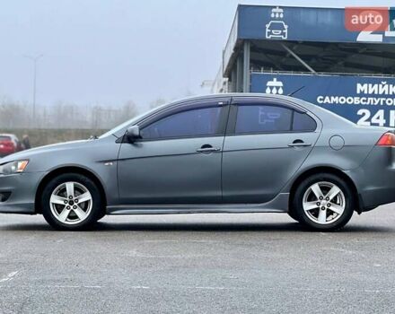 Серый Мицубиси Лансер, объемом двигателя 2 л и пробегом 203 тыс. км за 4999 $, фото 2 на Automoto.ua