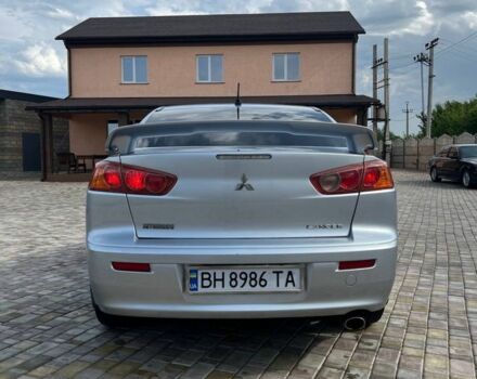 Сірий Міцубісі Lancer, об'ємом двигуна 2 л та пробігом 238 тис. км за 6400 $, фото 4 на Automoto.ua