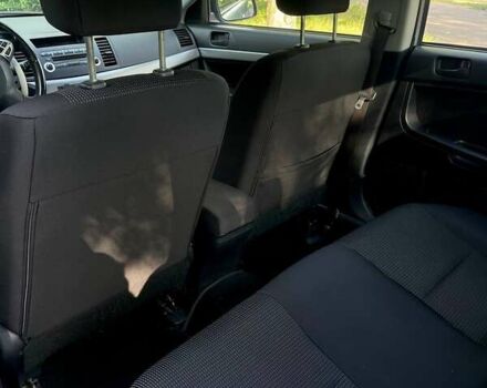 Серый Мицубиси Лансер, объемом двигателя 2 л и пробегом 112 тыс. км за 7900 $, фото 16 на Automoto.ua