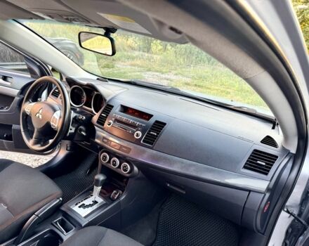 Серый Мицубиси Лансер, объемом двигателя 2 л и пробегом 223 тыс. км за 6890 $, фото 18 на Automoto.ua