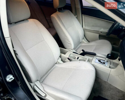 Серый Мицубиси Лансер, объемом двигателя 2 л и пробегом 212 тыс. км за 6000 $, фото 25 на Automoto.ua