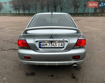 Сірий Міцубісі Lancer, об'ємом двигуна 1.6 л та пробігом 254 тис. км за 3800 $, фото 5 на Automoto.ua