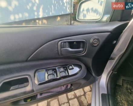 Сірий Міцубісі Lancer, об'ємом двигуна 1.6 л та пробігом 290 тис. км за 3850 $, фото 4 на Automoto.ua