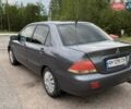 Серый Мицубиси Лансер, объемом двигателя 1.58 л и пробегом 250 тыс. км за 4200 $, фото 7 на Automoto.ua