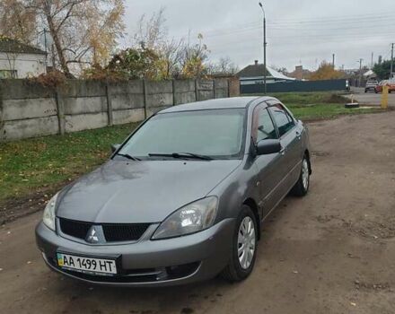 Сірий Міцубісі Lancer, об'ємом двигуна 1.58 л та пробігом 1 тис. км за 2850 $, фото 2 на Automoto.ua