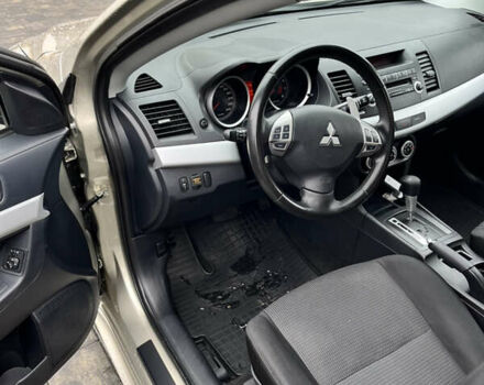 Сірий Міцубісі Lancer, об'ємом двигуна 2 л та пробігом 230 тис. км за 6800 $, фото 19 на Automoto.ua