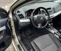 Сірий Міцубісі Lancer, об'ємом двигуна 2 л та пробігом 230 тис. км за 6800 $, фото 19 на Automoto.ua