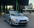 Серый Мицубиси Лансер, объемом двигателя 2 л и пробегом 220 тыс. км за 5993 $, фото 1 на Automoto.ua