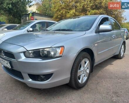 Серый Мицубиси Лансер, объемом двигателя 2 л и пробегом 103 тыс. км за 7700 $, фото 4 на Automoto.ua