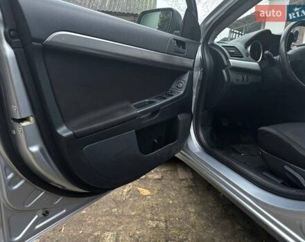 Серый Мицубиси Лансер, объемом двигателя 1.5 л и пробегом 147 тыс. км за 6700 $, фото 13 на Automoto.ua