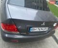 Сірий Міцубісі Lancer, об'ємом двигуна 1.6 л та пробігом 250 тис. км за 3500 $, фото 7 на Automoto.ua