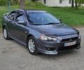 Сірий Міцубісі Lancer, об'ємом двигуна 2 л та пробігом 153 тис. км за 7499 $, фото 1 на Automoto.ua