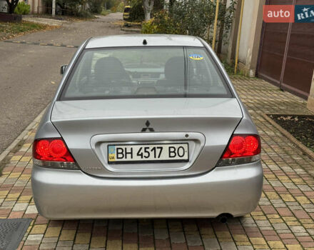 Сірий Міцубісі Lancer, об'ємом двигуна 1.6 л та пробігом 221 тис. км за 3650 $, фото 14 на Automoto.ua