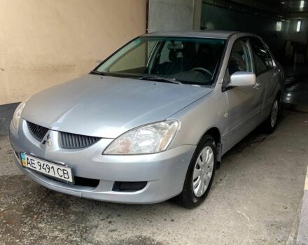 Сірий Міцубісі Lancer, об'ємом двигуна 1.6 л та пробігом 196 тис. км за 4700 $, фото 3 на Automoto.ua
